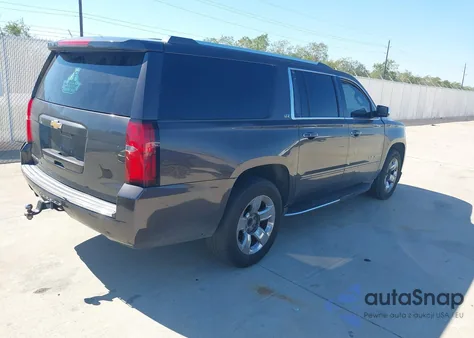 2015 Chevrolet Suburban 1500 Ltz z USA, uszkodzony, nr VIN 1GNSCKKC6FR742708
